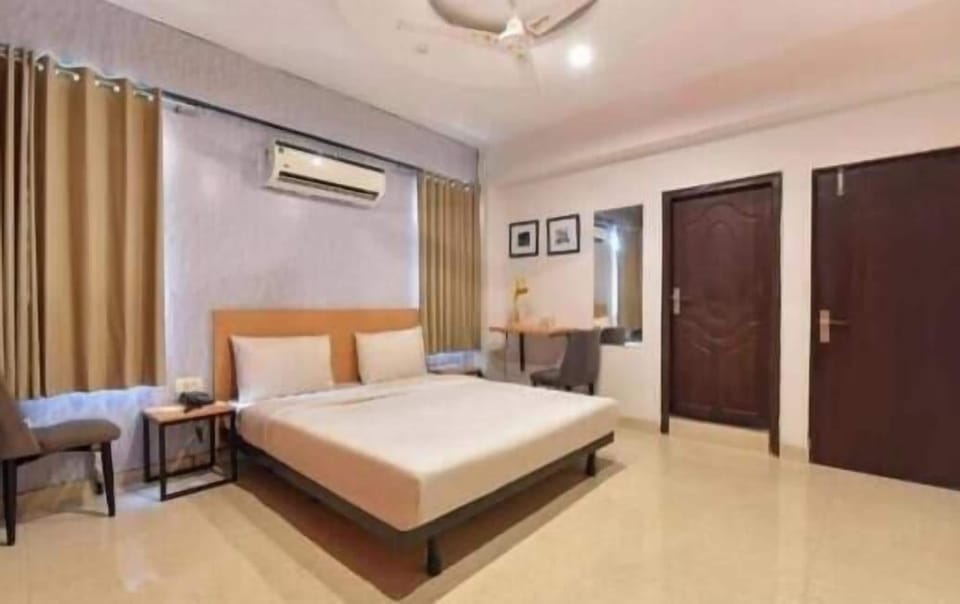 Blackout drapes, soundproofing, iron/ironing board