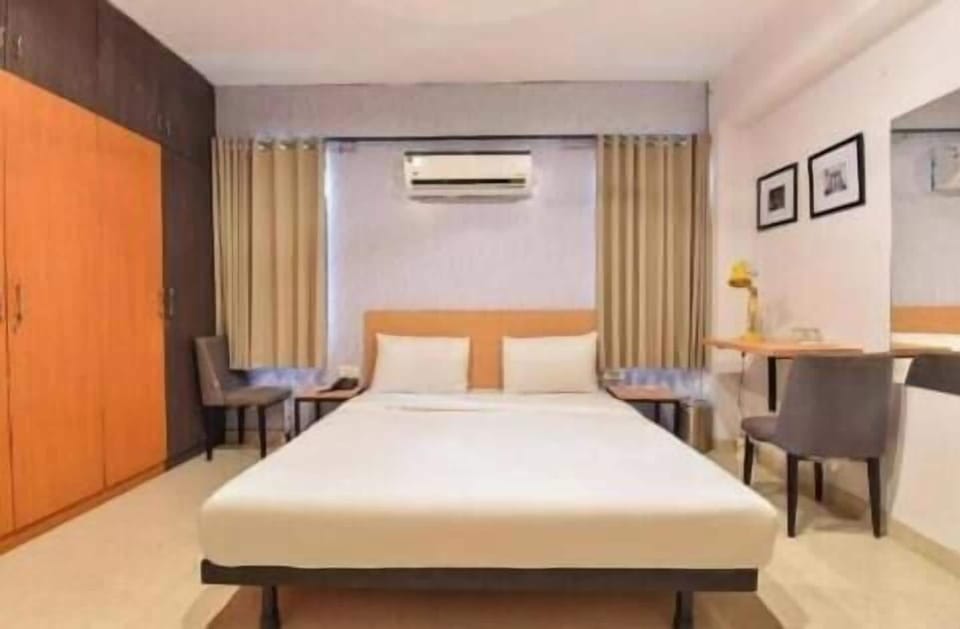 Blackout drapes, soundproofing, iron/ironing board