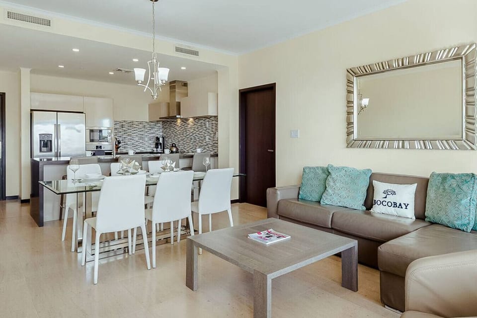 Open kitchen and dining area with a full setup—easy for cooking, dining, and hanging out together.