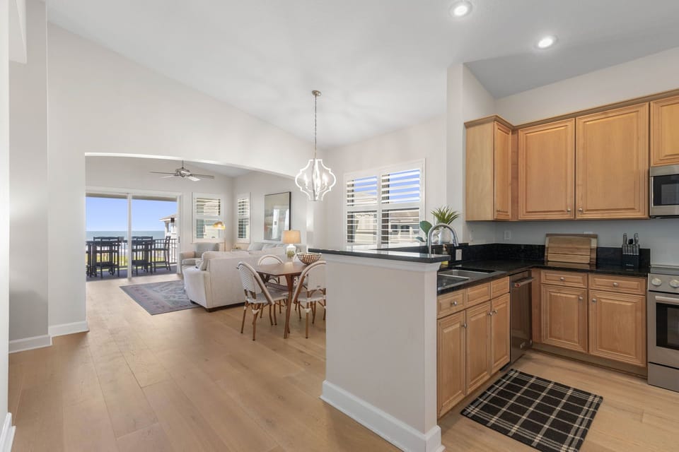 Open Concept living with Vaulted Ceilings makes the space feel very bright and open!