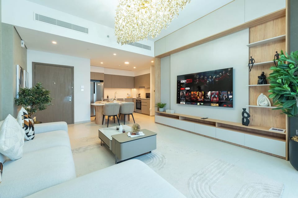 Apartment, City View | Living area | 75-inch Smart TV with cable channels