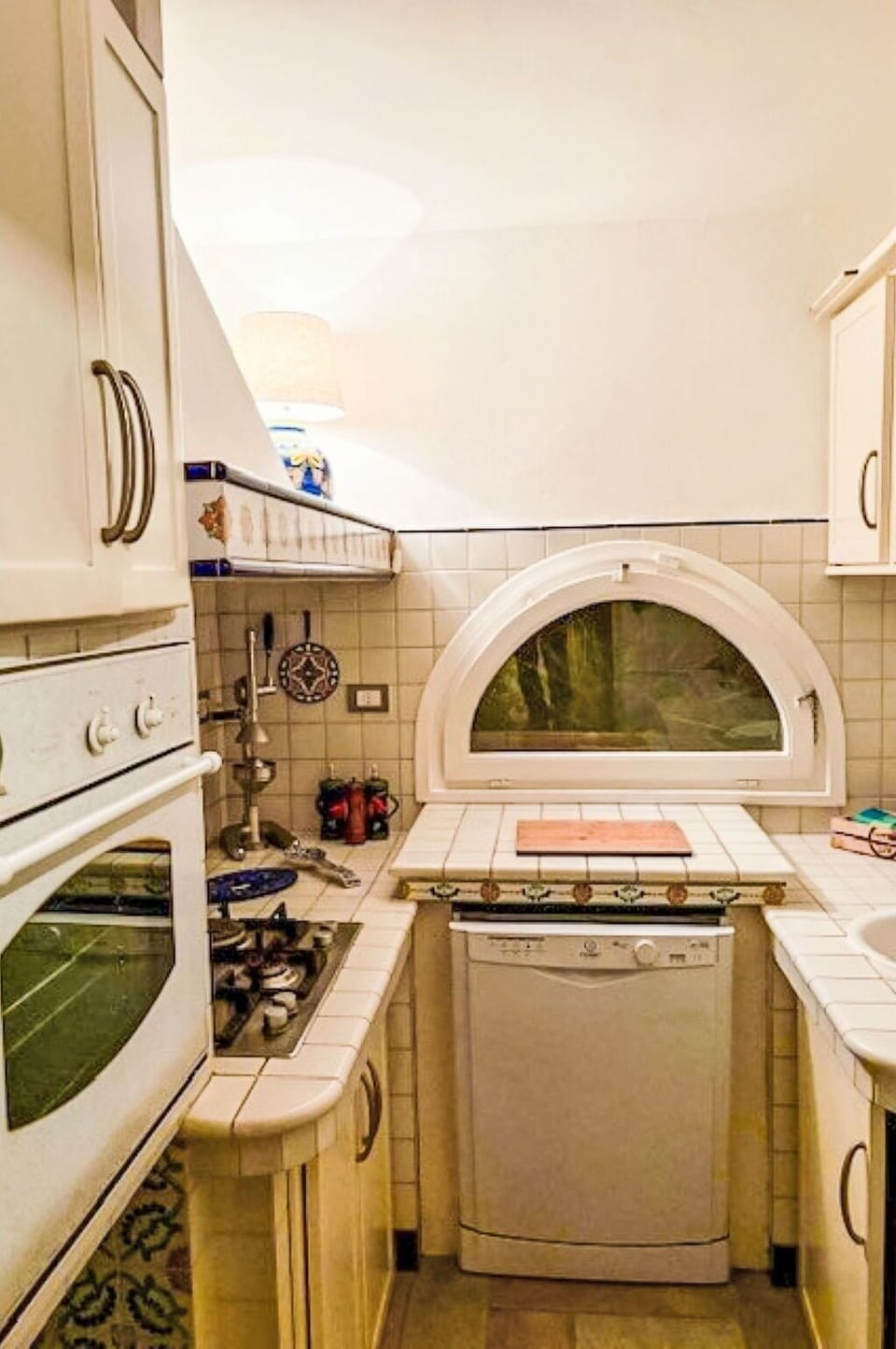 Kitchen, Interior Design, Major Appliance, Flooring, Kitchen Appliance, Kitchen Stove, Countertop, Floor, Gas Stove, Room
