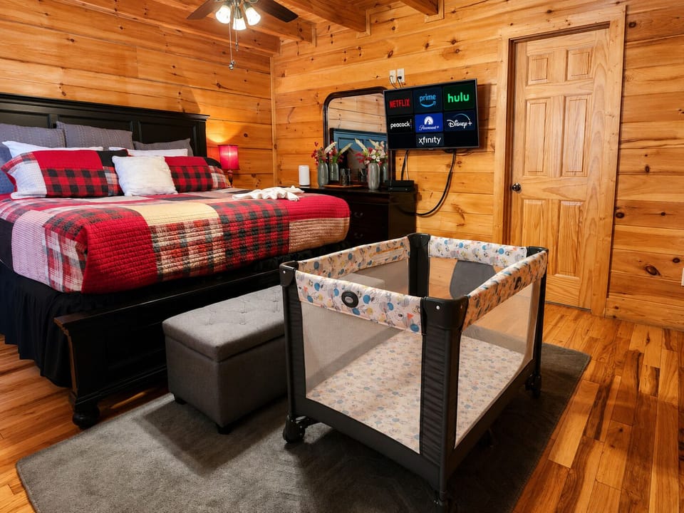 Cozy Loft Bedroom with Plaid Bedding & Pack-n-Play – Smoky Mountain Lodge