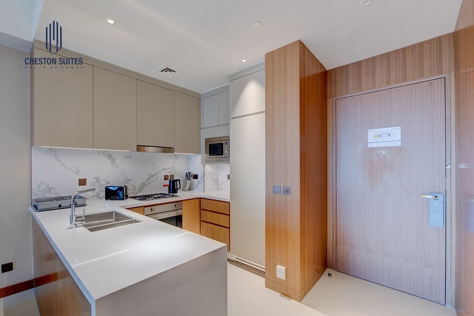 The kitchen and dining area layout and furnishings may vary slightly between rooms, yet each offers a stylish, comfortable, and well-appointed setting for your stay
