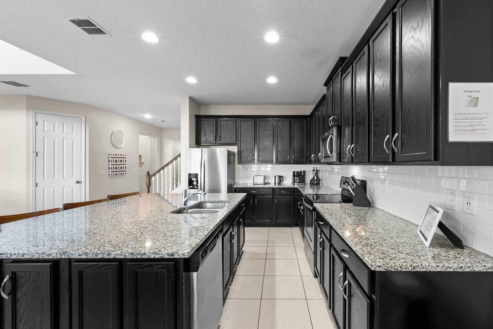 Cook in Style – This kitchen features high-end appliances, ample storage, and everything you need for a seamless culinary experience.