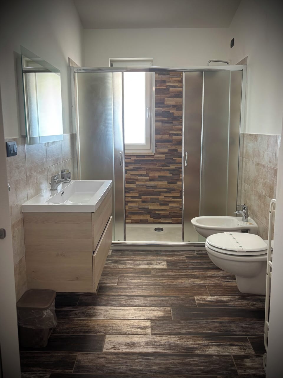 Shower, hair dryer, towels, toilet paper