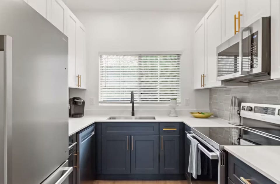 Bright and spacious kitchen with premium appliances and ample counter space.