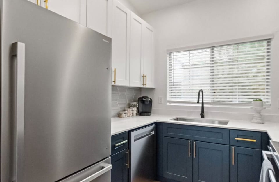 Bright kitchen with natural light and modern cooking conveniences.