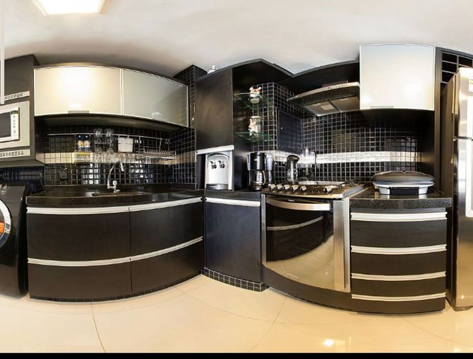 Apartment | Private kitchen | Fridge, microwave, stovetop, blender
