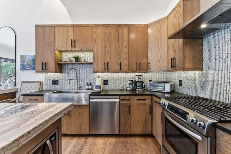 Beautifully updated, fully equipped kitchen with bar seating