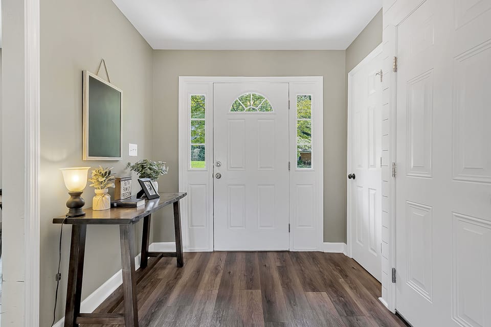 The interior front door provides direct access to the home, making arrivals simple and secure with keypad entry and a smooth transition into the main living space.