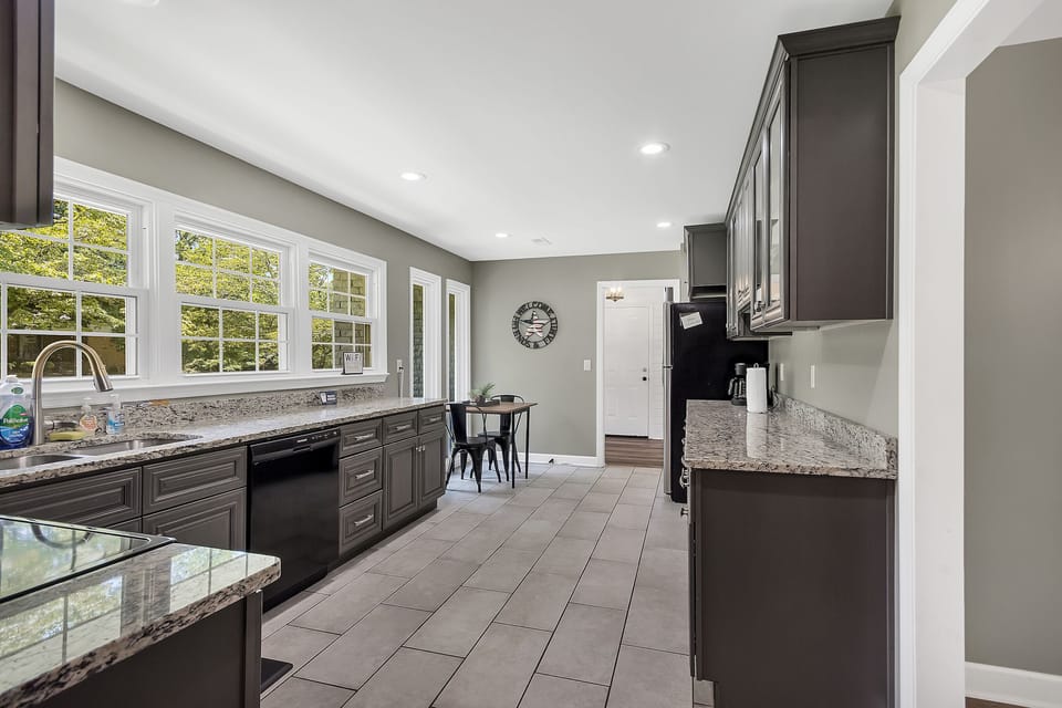 Spacious kitchen setup allows for easy movement and flow, whether you're cooking for a group or grabbing a quick bite before heading out.