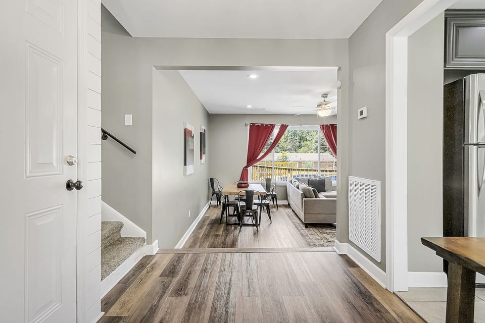 Step inside to a welcoming entry area that flows easily into the home, giving guests a clear path to nearby bedrooms, living spaces, and kitchen.