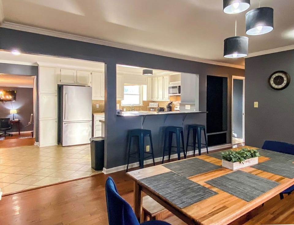 Just off the kitchen, the dining space makes it easy to gather everyone together, whether you're cooking or ordering in.