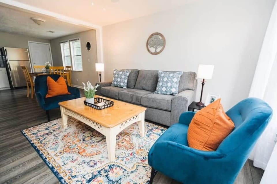 Comfortable seating invites you to settle in, whether you're catching up with friends, enjoying a movie, or just taking a moment to relax.