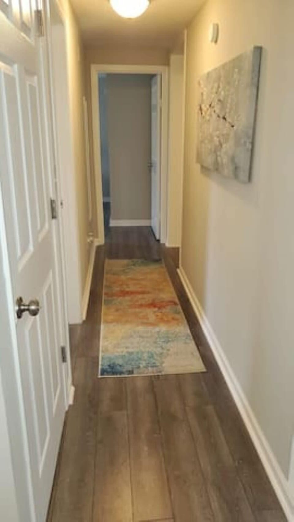 A simple hallway leads you to the bedrooms, making it easy to move through the home while keeping each space tucked away and private.