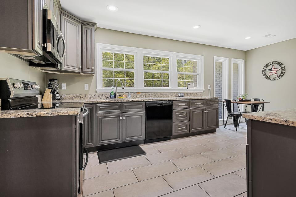 The kitchen is fully equipped with cookware, utensils, and essentials, making it simple to cook, serve, and gather without leaving the home.