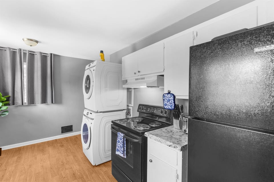 Bonus convenience—laundry is tucked right into the kitchen area, making longer stays easy and stress-free.