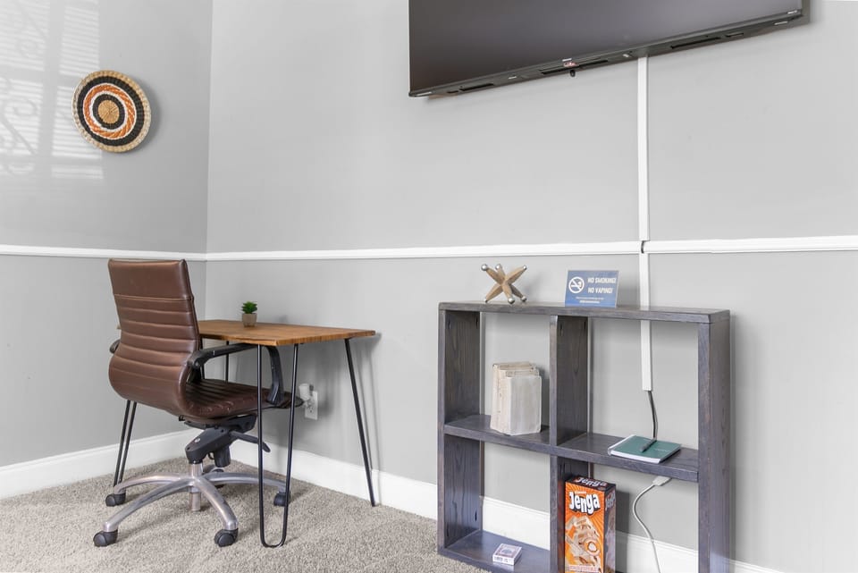 Need to catch up on work? This tucked-away workspace in the living room gives you a convenient spot to stay productive without missing out on the comfort of home.