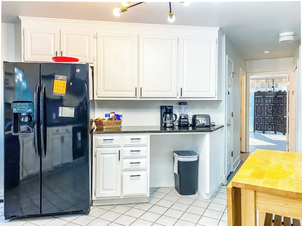 Angled lines and open flow make this kitchen feel both functional and visually striking, perfectly blending into the dome’s architectural style.