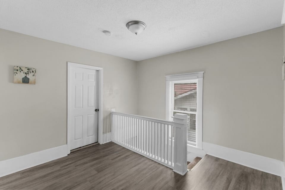 A view from upstairs highlights the home’s thoughtful layout, with a seamless flow between levels for both privacy and connection.