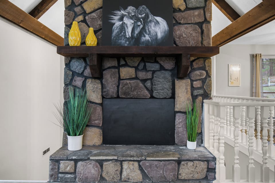 Warm, styled mantle with a decorative fireplace that brings all the cozy without the fuss