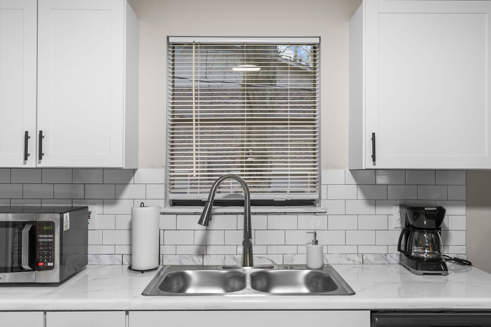Coffee maker set and sink space to prep, pour, and keep things moving without the rush