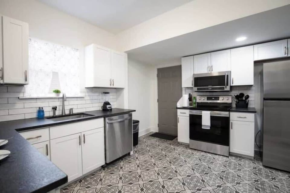 Whether you're making coffee or a full meal, the kitchen at Historic Norwood Haven offers stainless appliances and a clean, updated space to enjoy.