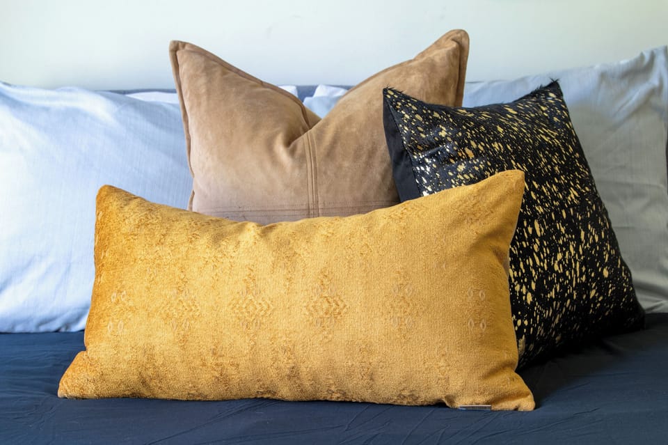 Thoughtful details help turn a house into a home. Cozy bedding and inviting accents create a welcoming space you'll look forward to returning to each evening.