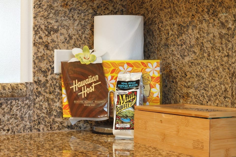 Granite counters and tropical touches create a warm, functional space for island-style cooking. FVW-L32