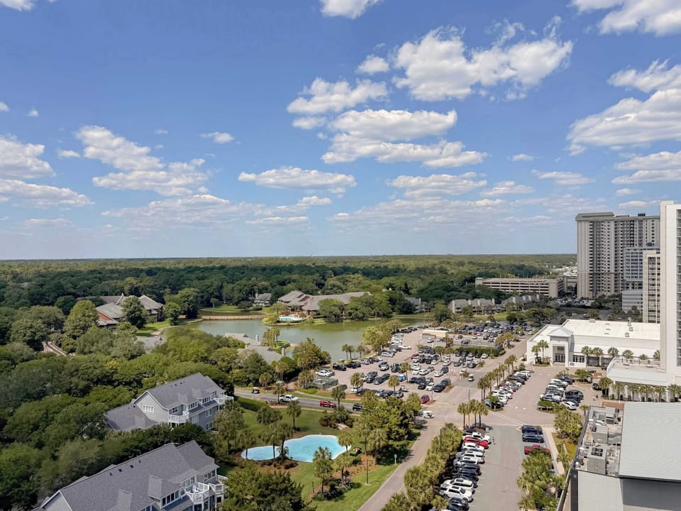 Overlook walking paths, lakes, and resort landscaping.