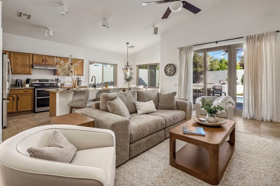 Stream, chat, and relax in this bright living space with big sofa.