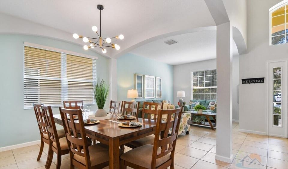 Elegant dining area with seating for eight, perfect for family gatherings.
