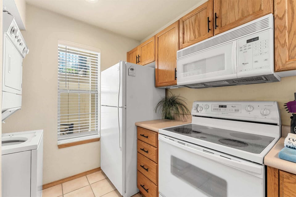 The open kitchen is well equipped for an unforgettable getaway​