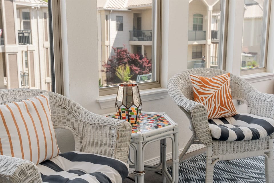 Sip morning coffee or an evening cocktail in the breezy sunroom​