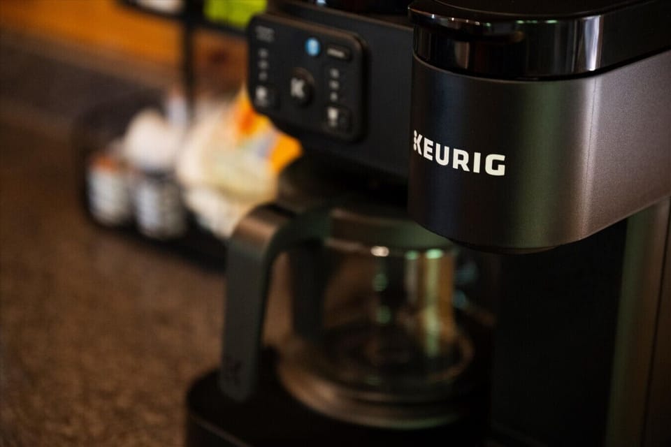 Start your day with freshly brewed coffee from the Keurig coffee maker while planning your next Smoky Mountain adventure.