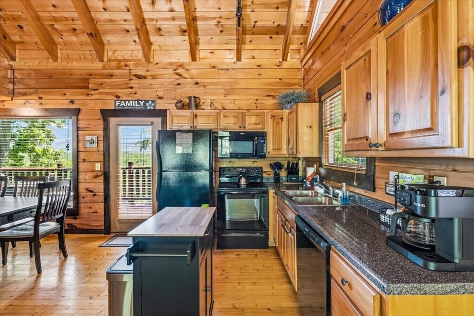 The kitchen seamlessly connects to the dining and living areas, making it easy to cook, serve, and spend time together.