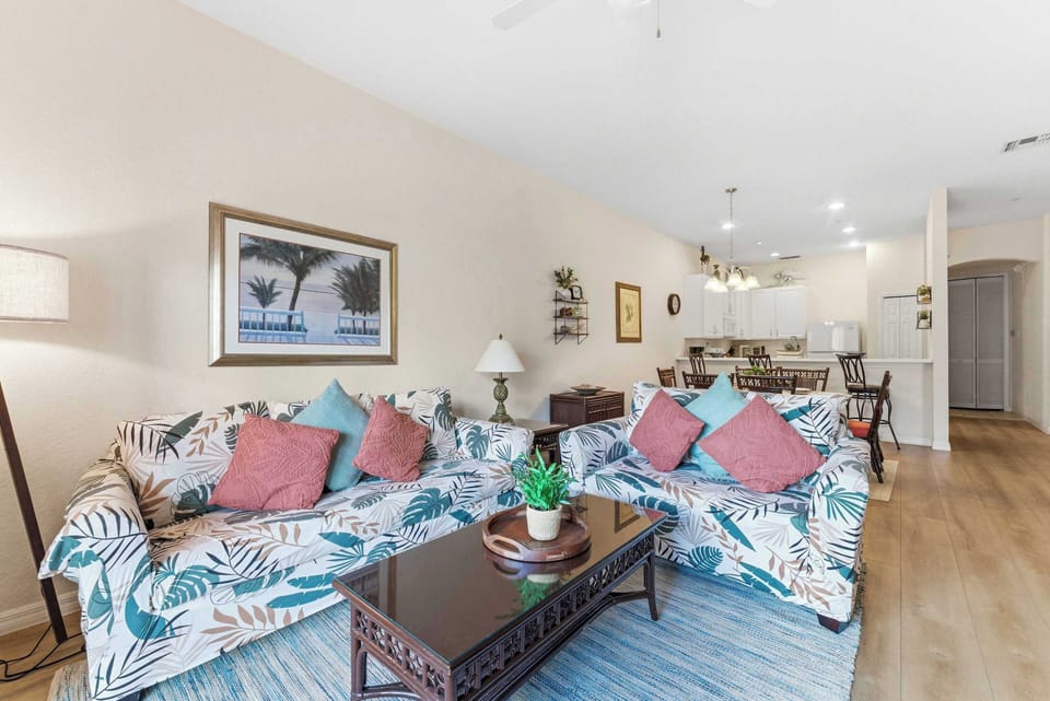 Smart TV, cozy seating, and a sofa sleeper for extra guests