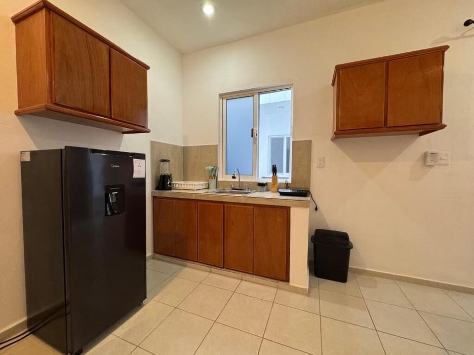 Mini-fridge, cookware/dishes/utensils