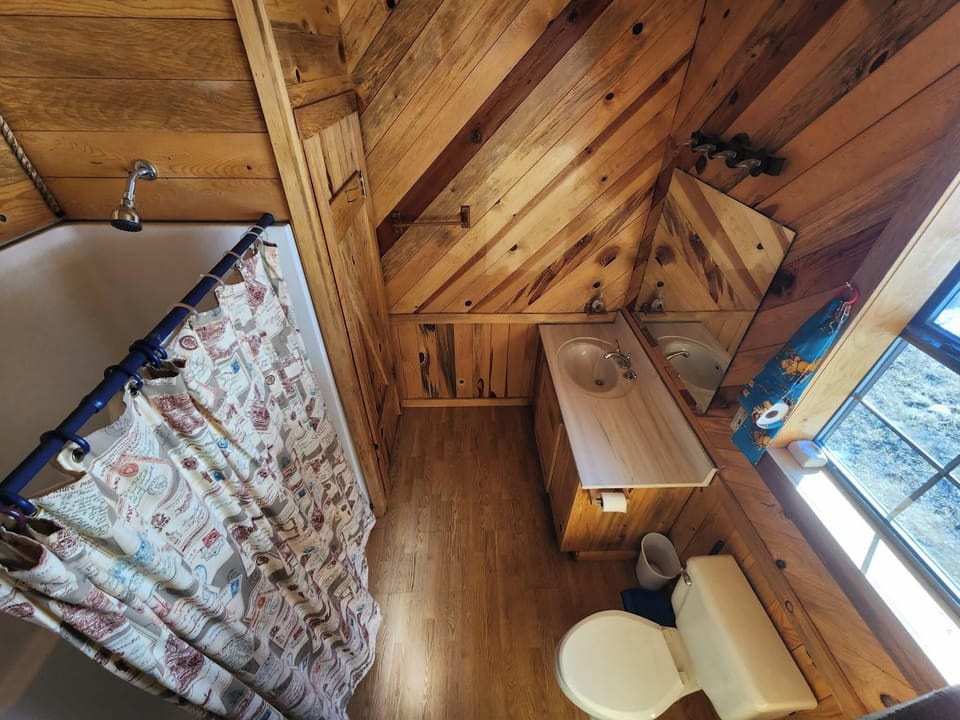 shower, bathtub, indoor, bathroom shower, toilet, daytime