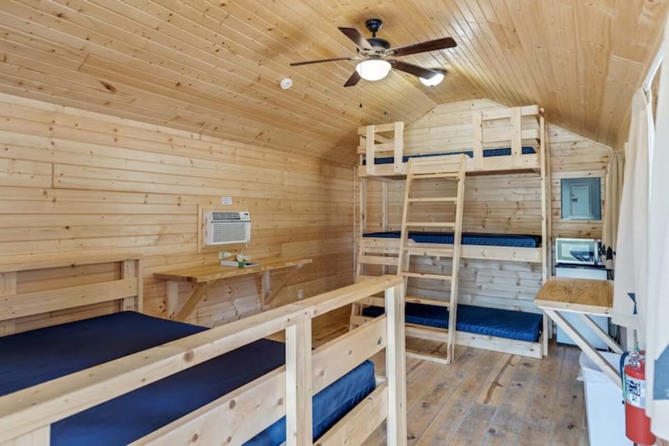 Settle in with roomy bunks and cozy cabin comfort.