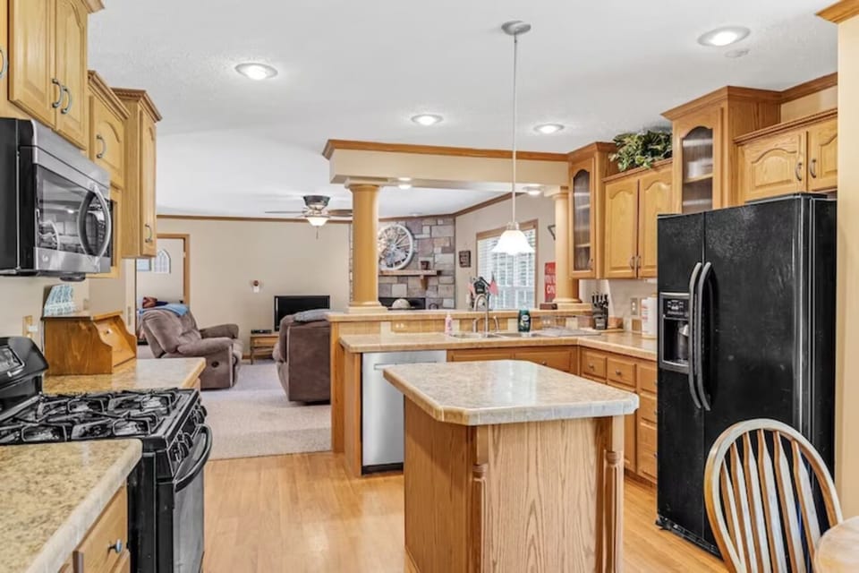 Cook together in the spacious kitchen with handy island.