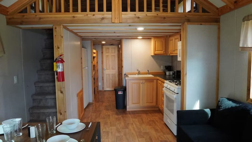 Gather for easy meals in this cozy, open-plan kitchenette.
