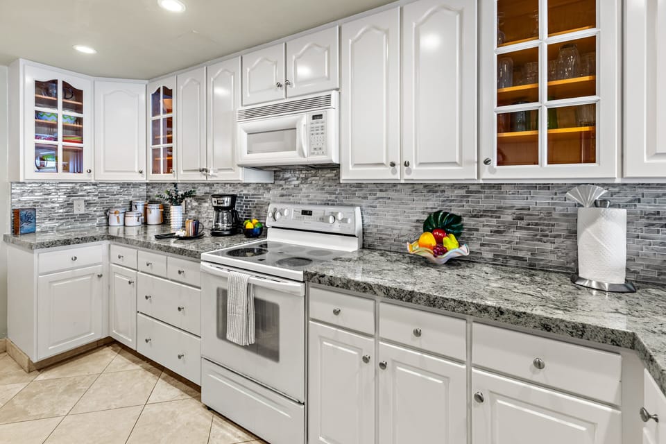 Fully equipped kitchen with granite countertops