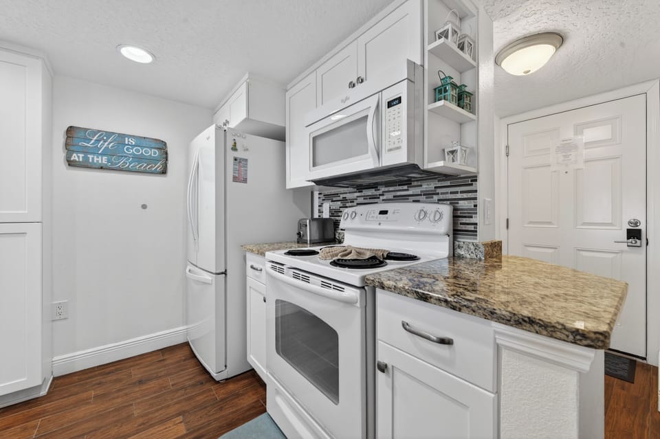 Full sized stove and refrigerator