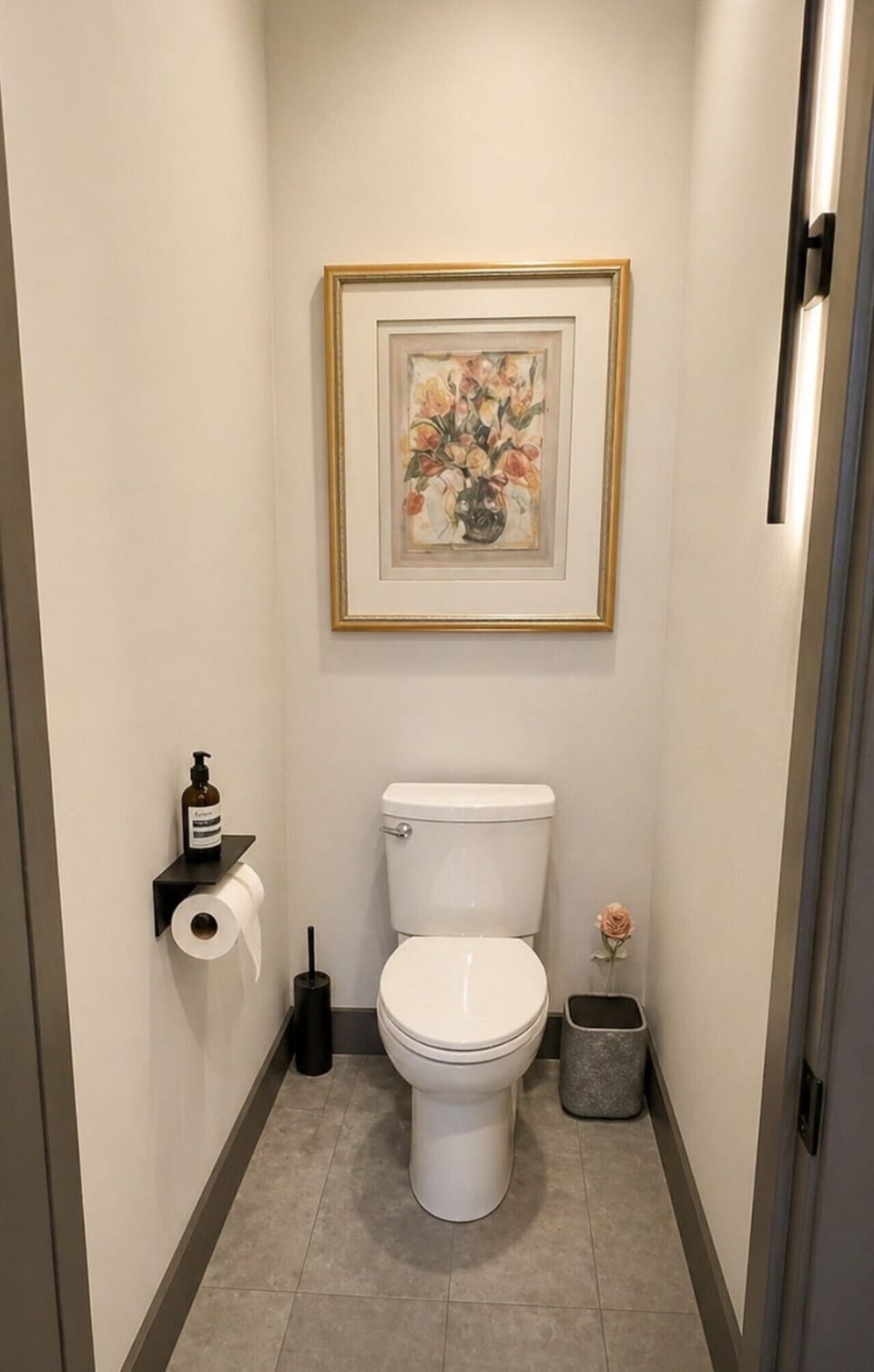 Half Bath Retreat: Brightly lit with elegant decor, this half bath offers style and convenience!