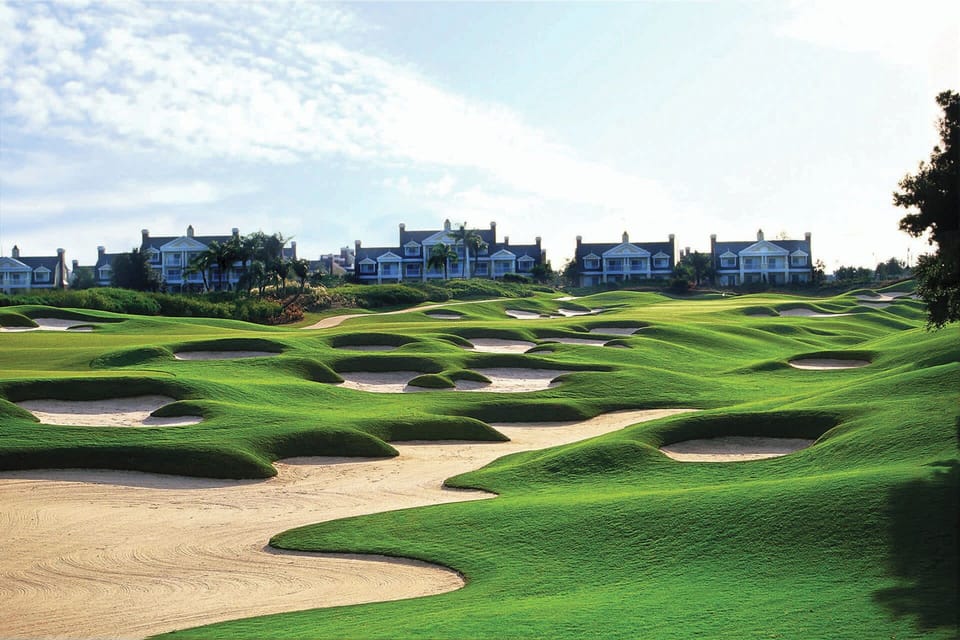 Scenic golf course views w/ lush greens stretching across the landscape