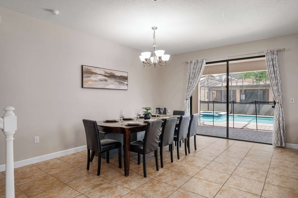 Dining table set for shared meals & easy conversation after a day of fun