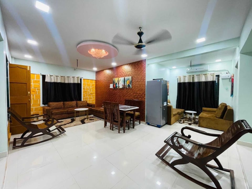 Family Quadruple Room, Pool View | Living area