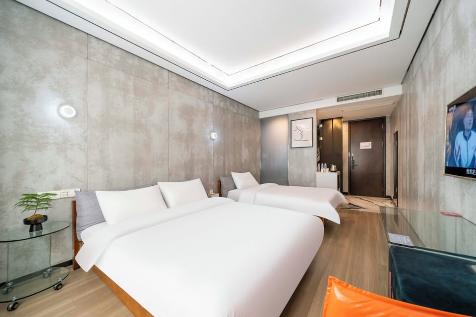 Family Twin Room, City View | Desk, laptop workspace, blackout drapes, iron/ironing board
